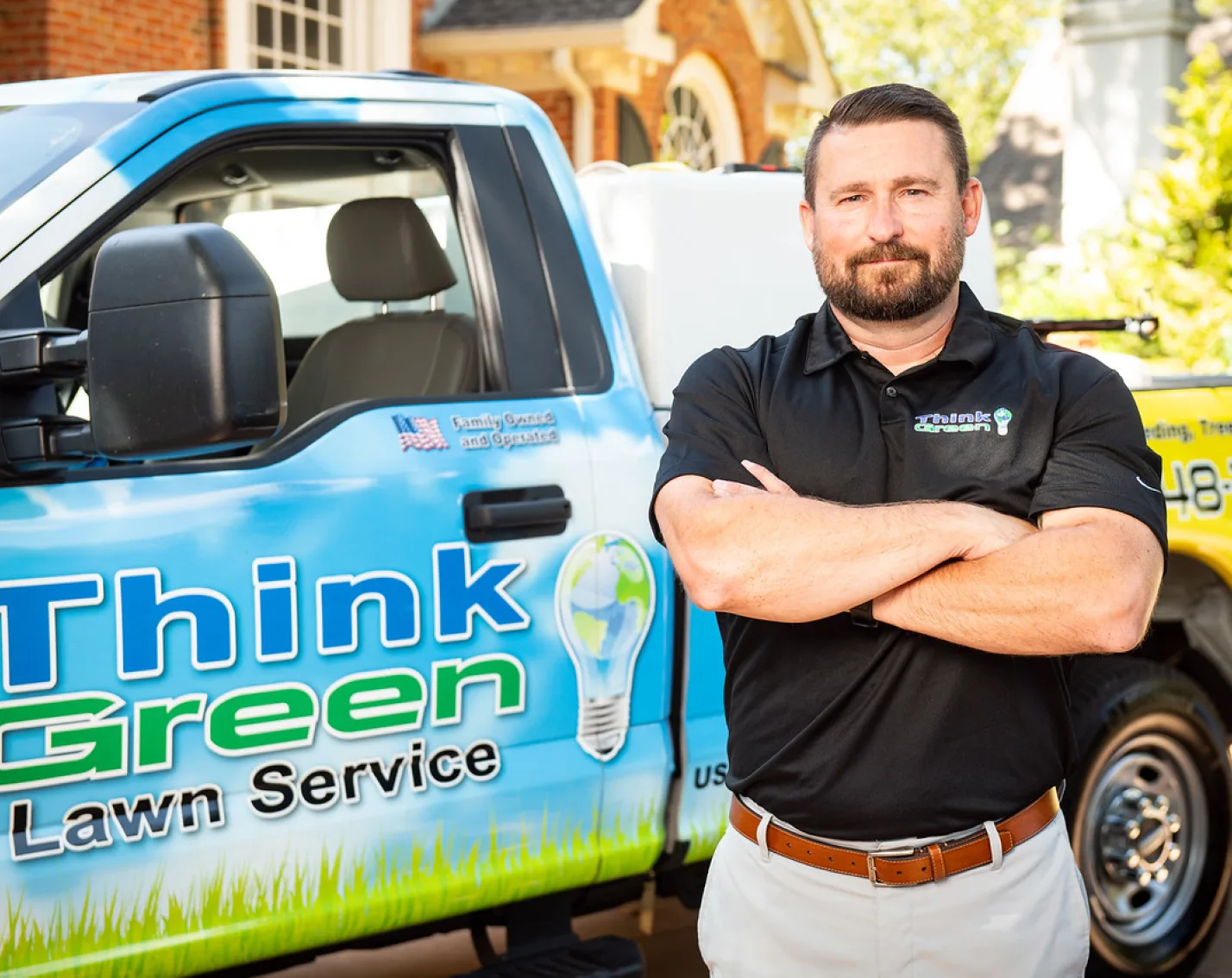 Think Green owner with service truck