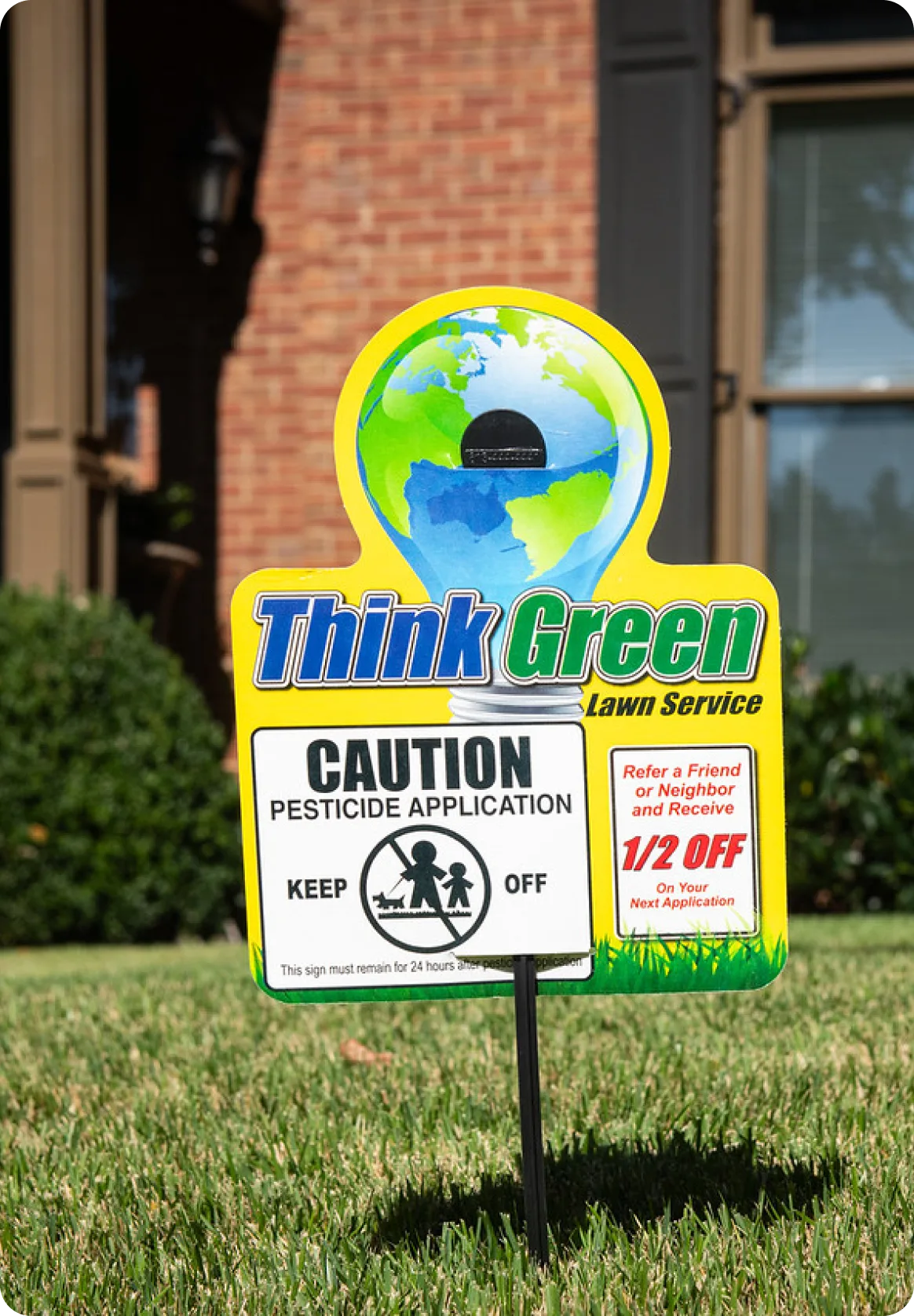 Think Green lawn care sign